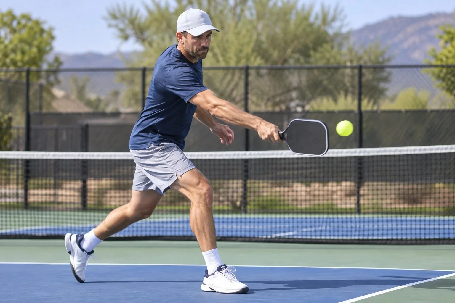 Player driving from the baseline with a stable paddle