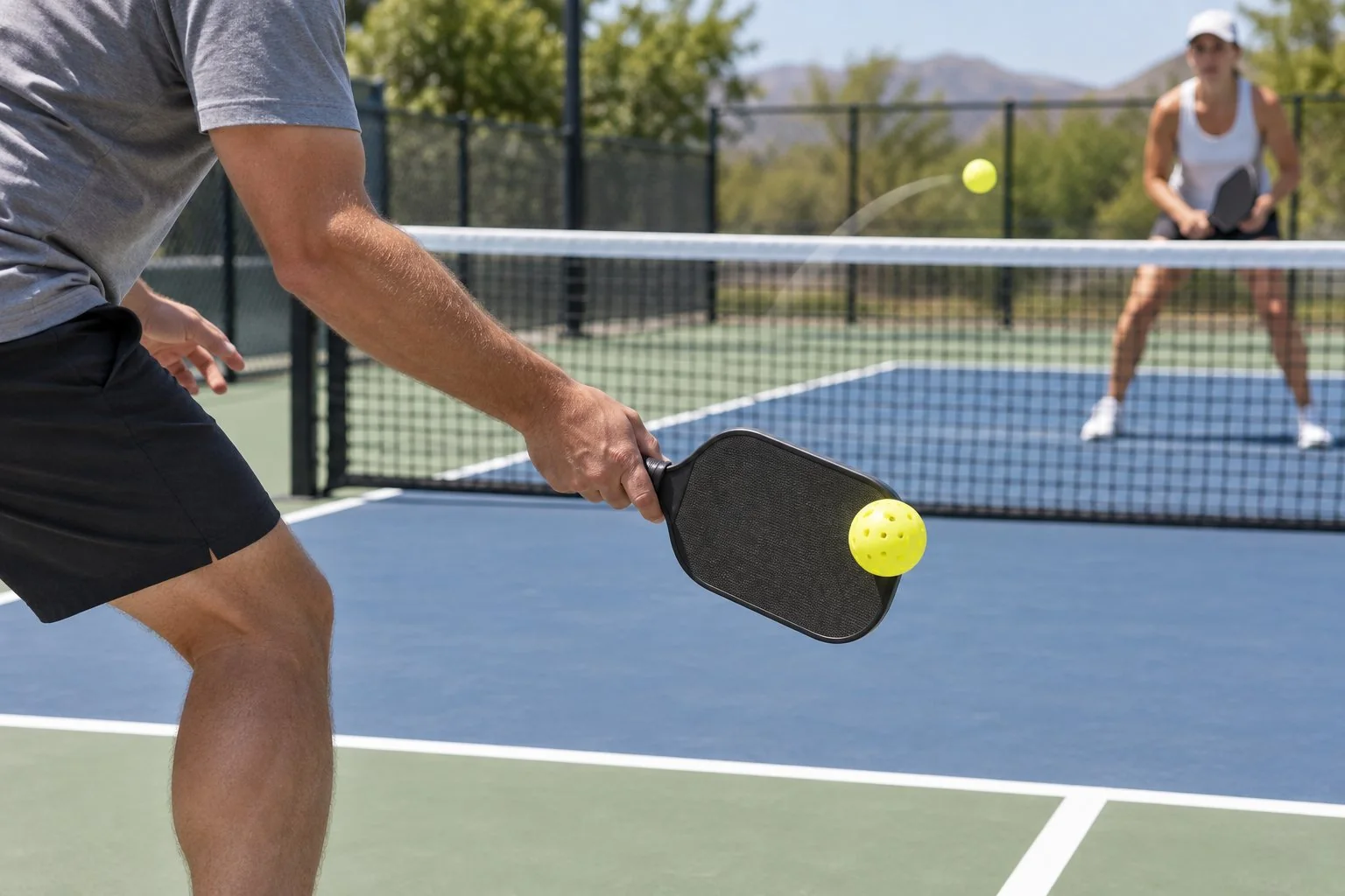 Paddle contact and a controlled dink arc
