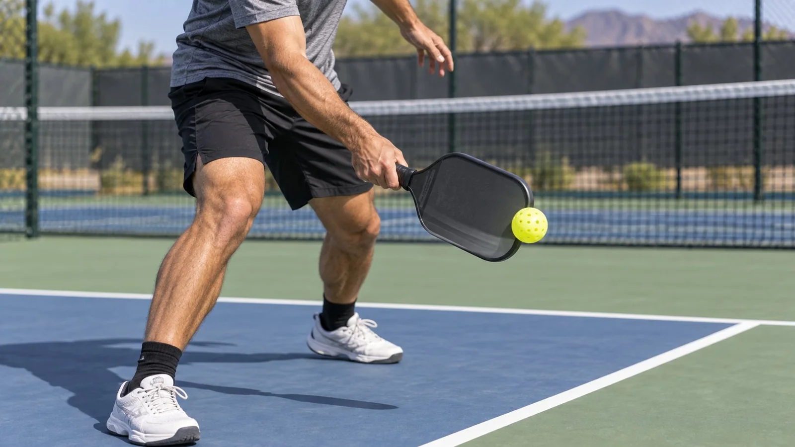 Close-up of balanced forehand slice contact in front of the hip