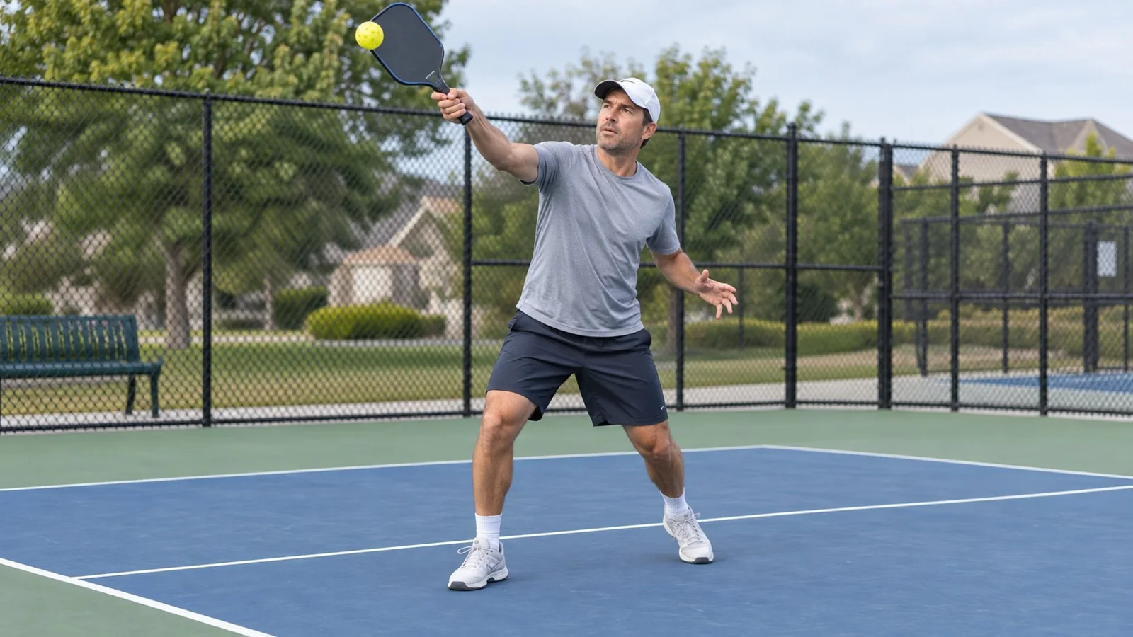 Balanced pickleball overhead contact with feet visible