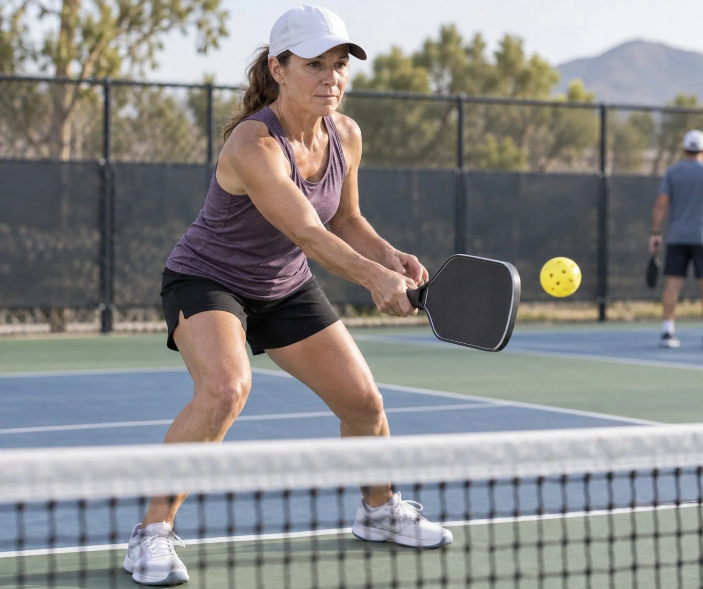 Overhead coaching diagram showing a backhand dink contact point and low kitchen target